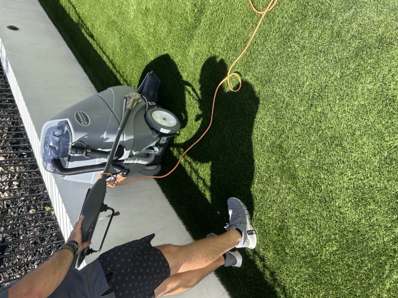 Mr. Green Turf Clean professional turf cleaning in action