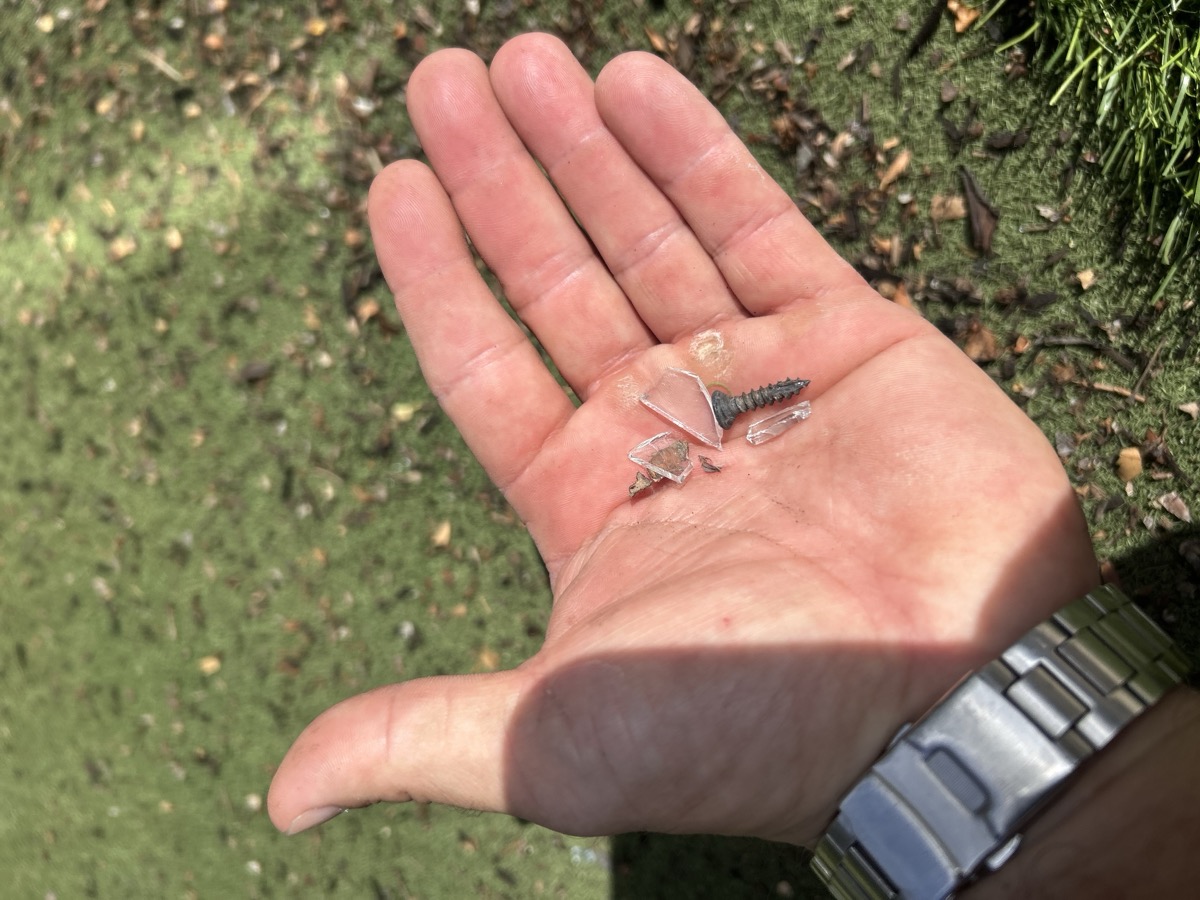 Professional turf cleaning equipment treating neglected artificial grass in San Diego